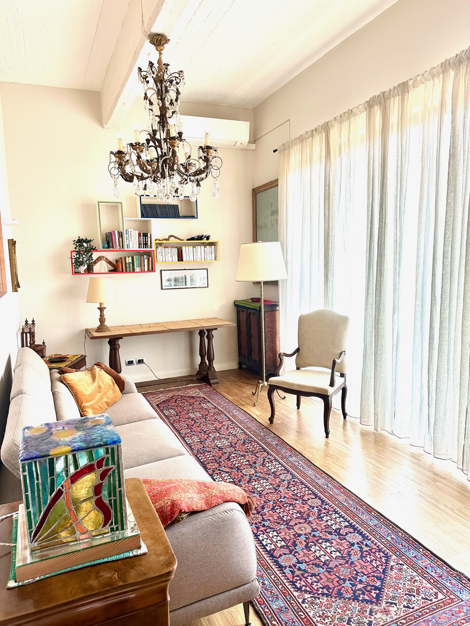 Living room with bookshelves and workspace